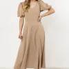 Elegancka sukienka rozkloszowana - beżowa