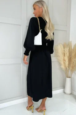 Elegancka sukienka z elastyczną talią - czarna