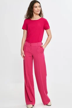Spodnie damskie z nogawką typu wide leg - różowe