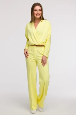 Spodnie dresowe z nogawkami typu wide leg - cytrynowe