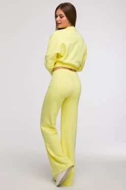 Spodnie dresowe z nogawkami typu wide leg - cytrynowe